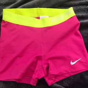 Pink Nike PRO dry fit workout shorts
